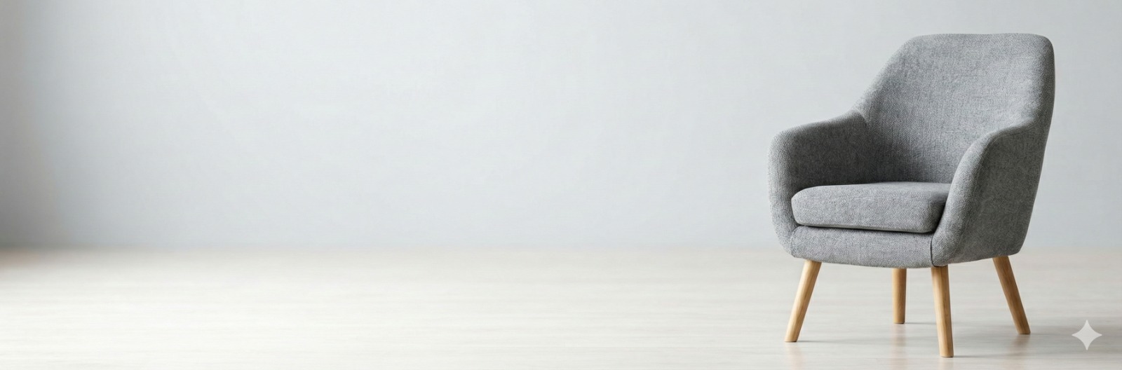 Butaca gris minimalista con producto a la derecha